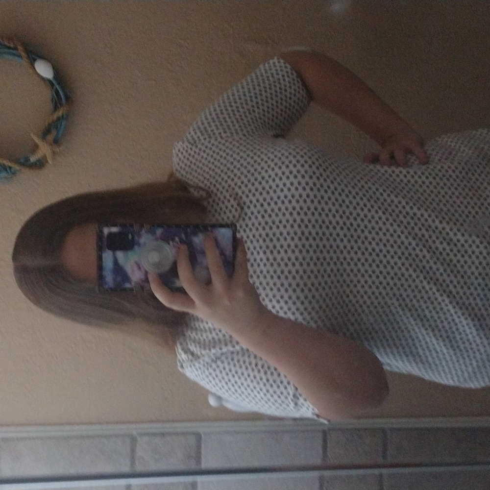 Polka dotted white top